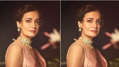 Dia further accessorised her look for the day in sleek white earrings and a statement neck choker with white stone studded details. (Instagram/@diamirzaofficial) Dia further accessorised her look for the day in sleek white earrings and a statement neck choker with white stone studded details. (Instagram/@diamirzaofficial)