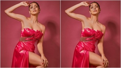 Malaika played muse to fashion designer house Dar Sara and picked a sleek satin gown from the shelves of the designer house. (Instagram/@malaikaaroraofficial)