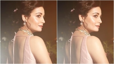 Dia posed for the pictures in a pastel pink saree with golden resham thread details and gave us all kinds of traditional vibes. (Instagram/@diamirzaofficial) Dia posed for the pictures in a pastel pink saree with golden resham thread details and gave us all kinds of traditional vibes. (Instagram/@diamirzaofficial)