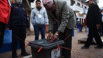 A Nepali election worker sealing a ballot box after polling. (AFP File Photo)