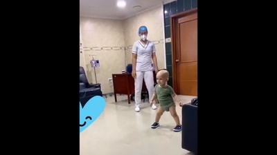 Toddler dancing with the nurse. (Instagram/@goodnews_movement) Toddler dancing with the nurse. (Instagram/@goodnews_movement)