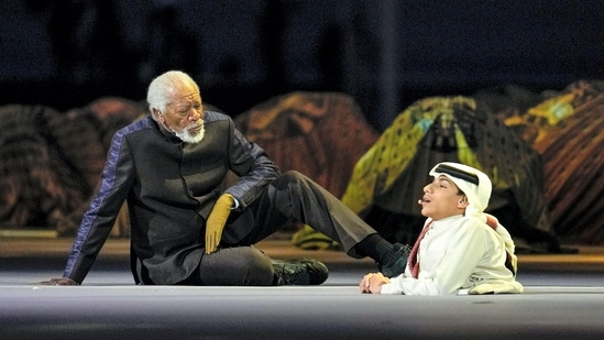 Morgan Freeman sits on the stage next to FIFA World Cup Ambassador Ghanim Al Muftah, at the opening ceremony. AP/PTI Photo(AP)