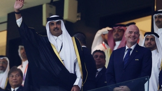 Emir of Qatar Sheikh Tamim bin Hamad Al Thani and FIFA president Gianni Infantino inside the stadium.(REUTERS)