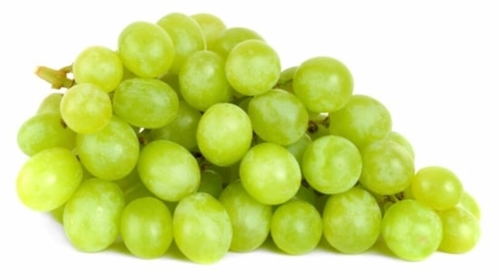 Grapes are loaded with Vitamin C, which helps in preventing degeneration of skin cells and promote anti-ageing.(Unsplash)