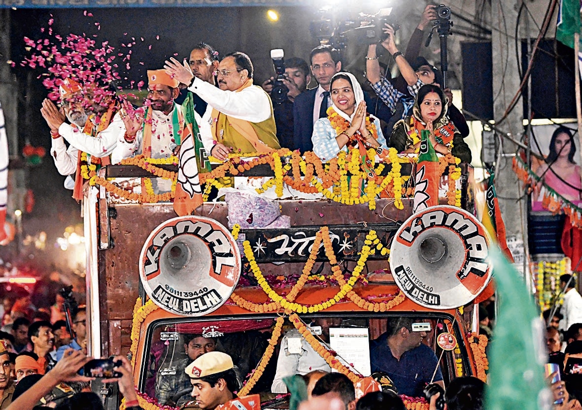 BJP president JP Nadda during a roadshow in Sangam Vihar in New Delhi on Sunday. (ANI) BJP president JP Nadda during a roadshow in Sangam Vihar in New Delhi on Sunday. (ANI)