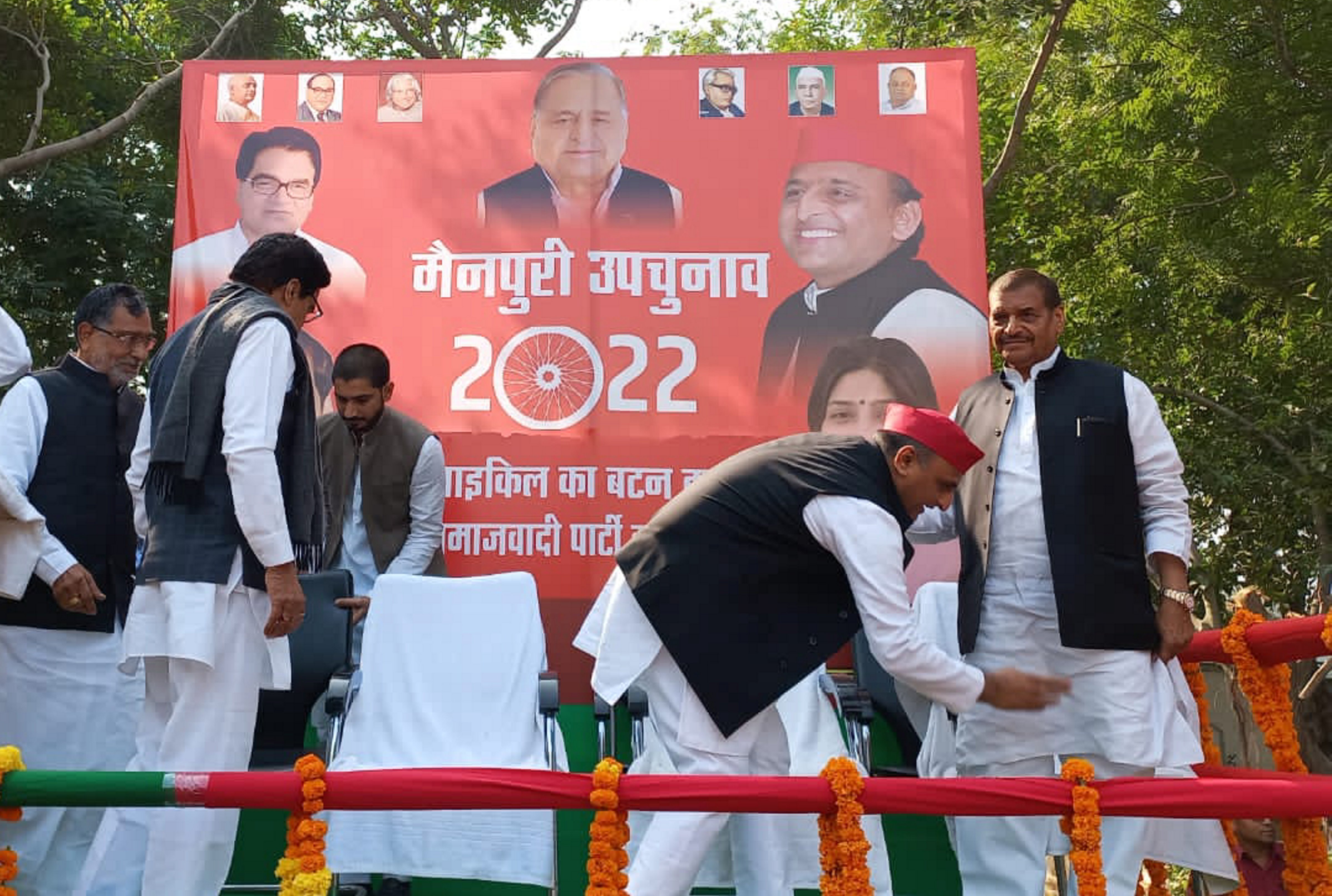 Akhilesh Yadav seeks blessings from Shivpal Singh Yadav during Mainpuri Lok Sabha bypoll campaign. (PTI) Akhilesh Yadav seeks blessings from Shivpal Singh Yadav during Mainpuri Lok Sabha bypoll campaign. (PTI)
