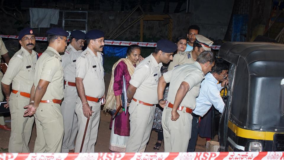 Police investigate the crime spot after an explosion in an auto-rickshaw, in Mangaluru. (PTI Photo) Police investigate the crime spot after an explosion in an auto-rickshaw, in Mangaluru. (PTI Photo)