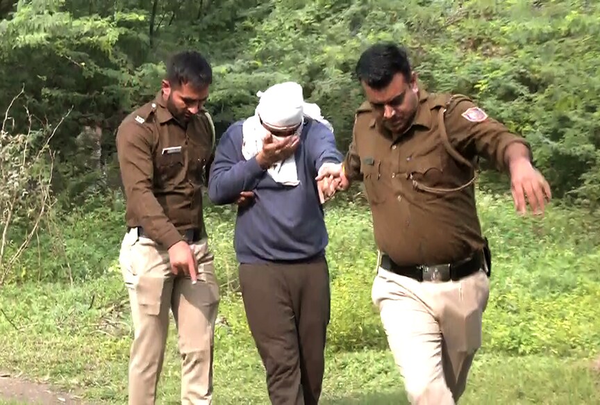 Delhi Police bring the accused Aaftab Amin Poonawala in the Shraddha Walker murder case to the jungle area to recover other body parts disposed off by the accused, in New Delhi. (ANI Photo) Delhi Police bring the accused Aaftab Amin Poonawala in the Shraddha Walker murder case to the jungle area to recover other body parts disposed off by the accused, in New Delhi. (ANI Photo)