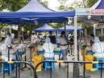 Office workers queue at a Covid-19 testing station in Shenzhen, China, on Saturday.
