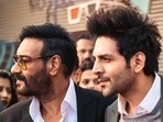Kartik Aaryan and Ajay Devgn at the 53rd edition of IFFI in Goa. Kartik Aaryan and Ajay Devgn at the 53rd edition of IFFI in Goa.