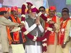 Gujarat polls 2022: PM Modi campaigning in Surendranagar. (PTI) Gujarat polls 2022: PM Modi campaigning in Surendranagar. (PTI)