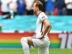 FILE - England's Harry Kane wears a rainbow armband as he takes the knee FILE - England's Harry Kane wears a rainbow armband as he takes the knee