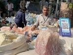 The vendor is selling rock salt on the horse cart but has a Paytm QR Code on display for payments. (Twitter/@AdityaVSC) The vendor is selling rock salt on the horse cart but has a Paytm QR Code on display for payments. (Twitter/@AdityaVSC)