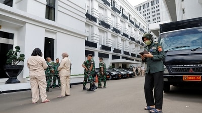 Indonesia Earthquake: People gather outside the Indonesia's Defense Ministry buildings following an earthquake in Jakarta, Indonesia. (Reuters)