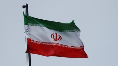 Iran's national flag waves in the wind over a building of the Iranian embassy, (REUTERS file)