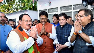 Bharatiya Janata Party (BJP) National President JP Nadda greets as he arrives to hold a meeting to review the preparations for the Municipal Corporation of Delhi (MCD) elections. (ANI Photo) Bharatiya Janata Party (BJP) National President JP Nadda greets as he arrives to hold a meeting to review the preparations for the Municipal Corporation of Delhi (MCD) elections. (ANI Photo)
