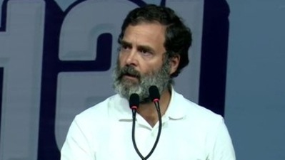 Congress MP Rahul Gandhi addresses a poll rally in Gujarat's Rajkot. (Twitter/ANI)