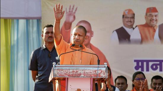 Kheda: Uttar Pradesh Chief Minister Yogi Adityanath during a public meeting ahead of Gujarat Assembly Elections, in Kheda district, Monday, Nov. 21, 2022. (PTI Photo)(PTI11_21_2022_000135A) (PTI)