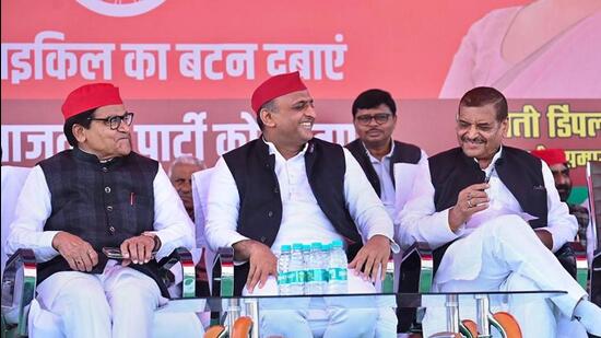 Samajwadi Party national president Akhilesh Yadav, party national general secretary Ram Gopal Yadav and PSP-L chief Shivpal Yadav at Jaswant Nagar in Etawah. (PTI PHOTO)