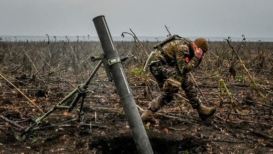 Russia-Ukraine War: A Ukrainian serviceman fires a mortar on a front line.(Reuters)