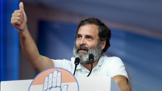 Rahul Gandhi addressing a public meeting in Gujarat’s Rajkot on Monday. (PTI)