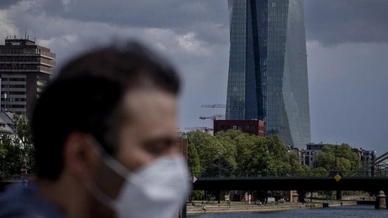 A man walks in front of the European Central Bank in Frankfurt, Germany. (File/ Representational) (AP)