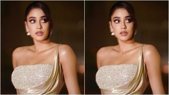 The ivory white satin throw featured a slip in detail on one shoulder, and wrap around details at the waist. It also came with one thigh high slit.(Instagram/@janhvikapoor)