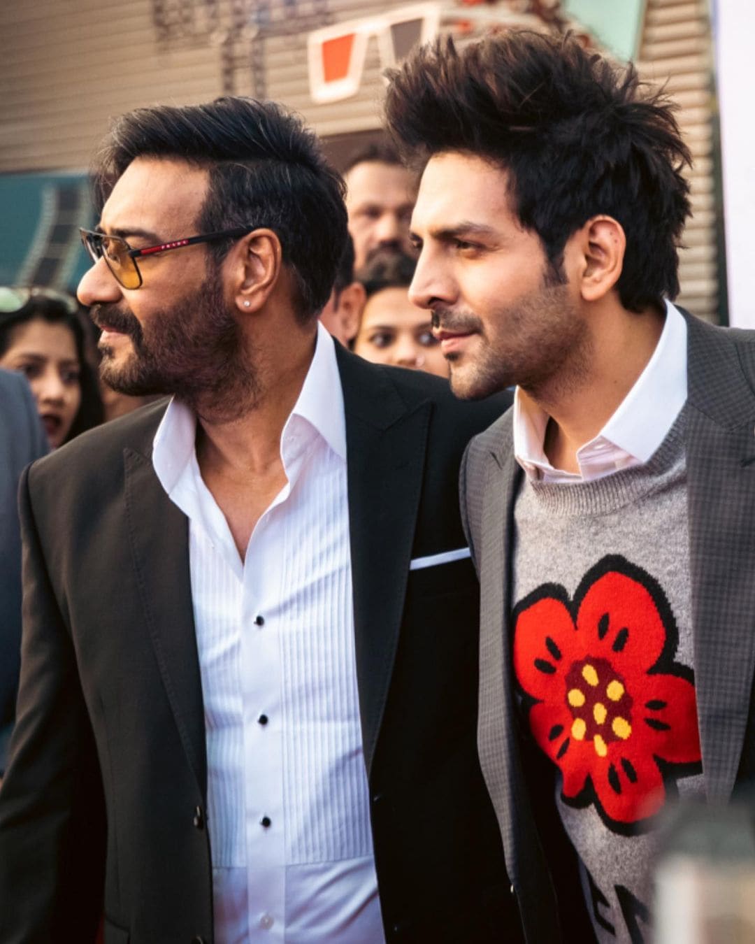 Kartik Aaryan and Ajay Devgn at the 53rd edition of IFFI in Goa. Kartik Aaryan and Ajay Devgn at the 53rd edition of IFFI in Goa.