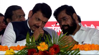 Navi Mumbai, India - Sept. 25, 2022:Dy CM Devendra Fadnavis and CM Eknath Shinde , During s Late Mathadi Leader Annasaheb Patil on his 89th Birth Anniversary celebration held at Kanda Batata Market,APMC Vashi in Navi Mumbai, India, on Sunday, September 25, 2022. (Photo by Bachchan Kumar/ HT PHOTO) (HT PHOTO) Navi Mumbai, India - Sept. 25, 2022:Dy CM Devendra Fadnavis and CM Eknath Shinde , During s Late Mathadi Leader Annasaheb Patil on his 89th Birth Anniversary celebration held at Kanda Batata Market,APMC Vashi in Navi Mumbai, India, on Sunday, September 25, 2022. (Photo by Bachchan Kumar/ HT PHOTO) (HT PHOTO)