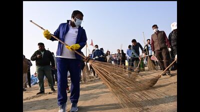 Cleanliness drive at Sangam area on Tuesday. (HT Photo) Cleanliness drive at Sangam area on Tuesday. (HT Photo)