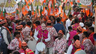 BJP supporters during a roadshow by party leaders, ahead of the Municipal Corporation of Delhi elections. (PTI) BJP supporters during a roadshow by party leaders, ahead of the Municipal Corporation of Delhi elections. (PTI)