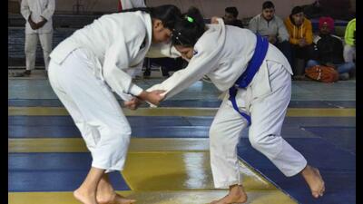 Players in action during a judo bout at the Inter-District Judo championship in Ludhiana. (HT PHOTO)