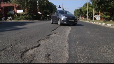 Pothole riddled roads in Sector 61, Mohali. (Sanjeev Sharma/HT) Pothole riddled roads in Sector 61, Mohali. (Sanjeev Sharma/HT)
