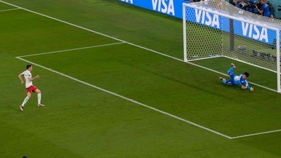 Mexico's goalkeeper Guillermo Ochoa saves on a penalty kick by Poland's Robert Lewandowski (AP) Mexico's goalkeeper Guillermo Ochoa saves on a penalty kick by Poland's Robert Lewandowski (AP)