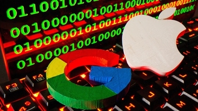 FILE PHOTO: 3D printed logos of Apple and Google are pictured on a keyboard in front of binary code in this illustration taken September 24, 2021. REUTERS/Dado Ruvic/Illustration/File Photo (REUTERS)