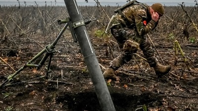 Russia-Ukraine War: A Ukrainian serviceman fires a mortar on a front line. (Reuters)