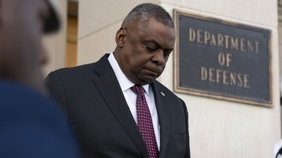 China-Taiwan Conflict: Secretary of Defense Lloyd Austin walks down the stairs at the Pentagon. (AP) China-Taiwan Conflict: Secretary of Defense Lloyd Austin walks down the stairs at the Pentagon. (AP)