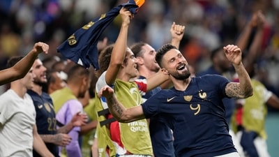 France's Olivier Giroud celebrate the win against Australia after the end of the FIFA World Cup group D match between France and Australia, at the Al Janoub Stadium in Al Wakrah, Qatar. (AP) France's Olivier Giroud celebrate the win against Australia after the end of the FIFA World Cup group D match between France and Australia, at the Al Janoub Stadium in Al Wakrah, Qatar. (AP)