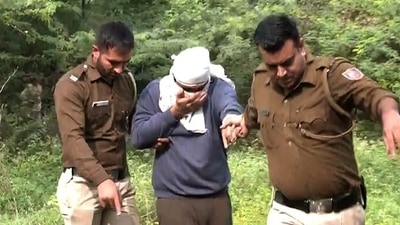 Delhi Police bring the accused Aaftab Amin Poonawala in the Shraddha Walker murder case to the jungle area to recover other body parts disposed off by the accused, in New Delhi. (ANI Photo) Delhi Police bring the accused Aaftab Amin Poonawala in the Shraddha Walker murder case to the jungle area to recover other body parts disposed off by the accused, in New Delhi. (ANI Photo)