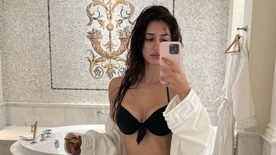 Disha Patani stuns in a black bikini in a gorgeous bathroom mirror selfie. (Instagram) Disha Patani stuns in a black bikini in a gorgeous bathroom mirror selfie. (Instagram)