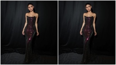 Mouni decked up in a maroon sequined gown as she posed for the pictures. (Instagram/@imouniroy) Mouni decked up in a maroon sequined gown as she posed for the pictures. (Instagram/@imouniroy)
