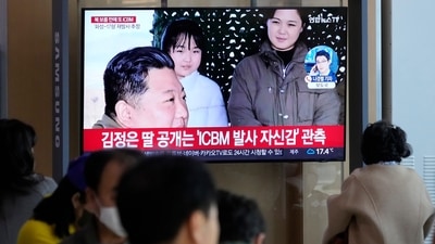 A TV screen shows an image of North Korean leader Kim Jong Un, left, his wife Ri Sol Ju, right, and his daughter during a news program at the Seoul Railway Station in Seoul, South Korea. (AP) A TV screen shows an image of North Korean leader Kim Jong Un, left, his wife Ri Sol Ju, right, and his daughter during a news program at the Seoul Railway Station in Seoul, South Korea. (AP)