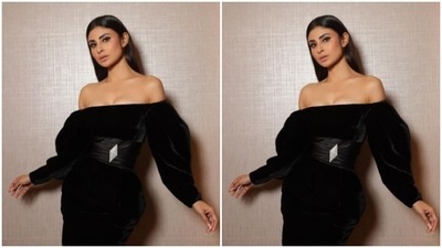 Mouni further accessorised her look for the day in black stilettos with feather details. (Instagram/@imouniroy) Mouni further accessorised her look for the day in black stilettos with feather details. (Instagram/@imouniroy)