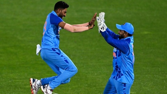Mohammed Siraj celebrates the wicket of Mitchell Santner during the T20I in Napier(AP)
