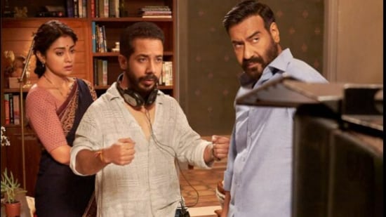 Abhishek Pathak with Ajay Devgn and Shriya Saran on the sets of Drishyam 2.