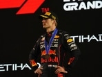 Max Verstappen on the podium after winning the Abu Dhabi Grand Prix