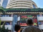 People watch the Sensex on a screen outside Bombay Stock Exchange (BSE) in Mumbai. (PTI File Photo) People watch the Sensex on a screen outside Bombay Stock Exchange (BSE) in Mumbai. (PTI File Photo)