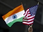 A man holds the flags of India and the US flag in New York.(REUTERS) A man holds the flags of India and the US flag in New York.(REUTERS)