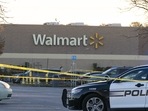 Law enforcement work the scene of a mass shooting at a Walmart, Wednesday in US state of Virginia. (AP ) Law enforcement work the scene of a mass shooting at a Walmart, Wednesday in US state of Virginia. (AP )