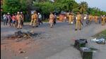 Security personnel walk past burnt ballot boxes after unknown people ransacked a polling station during 2018 panchayat polls. (PTI) Security personnel walk past burnt ballot boxes after unknown people ransacked a polling station during 2018 panchayat polls. (PTI)